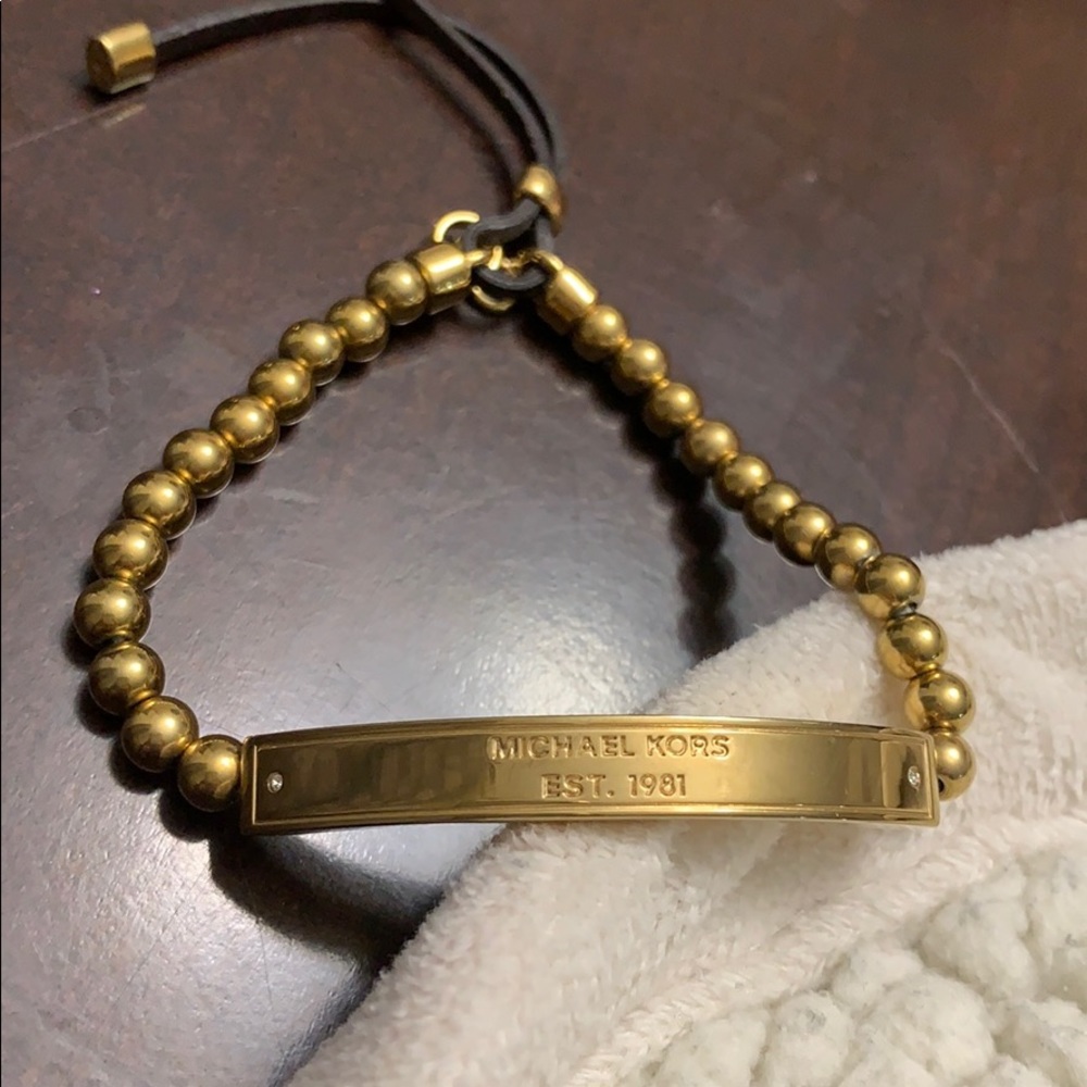 Michael Kors gold stretchy bracelet - Picture 1 of 3